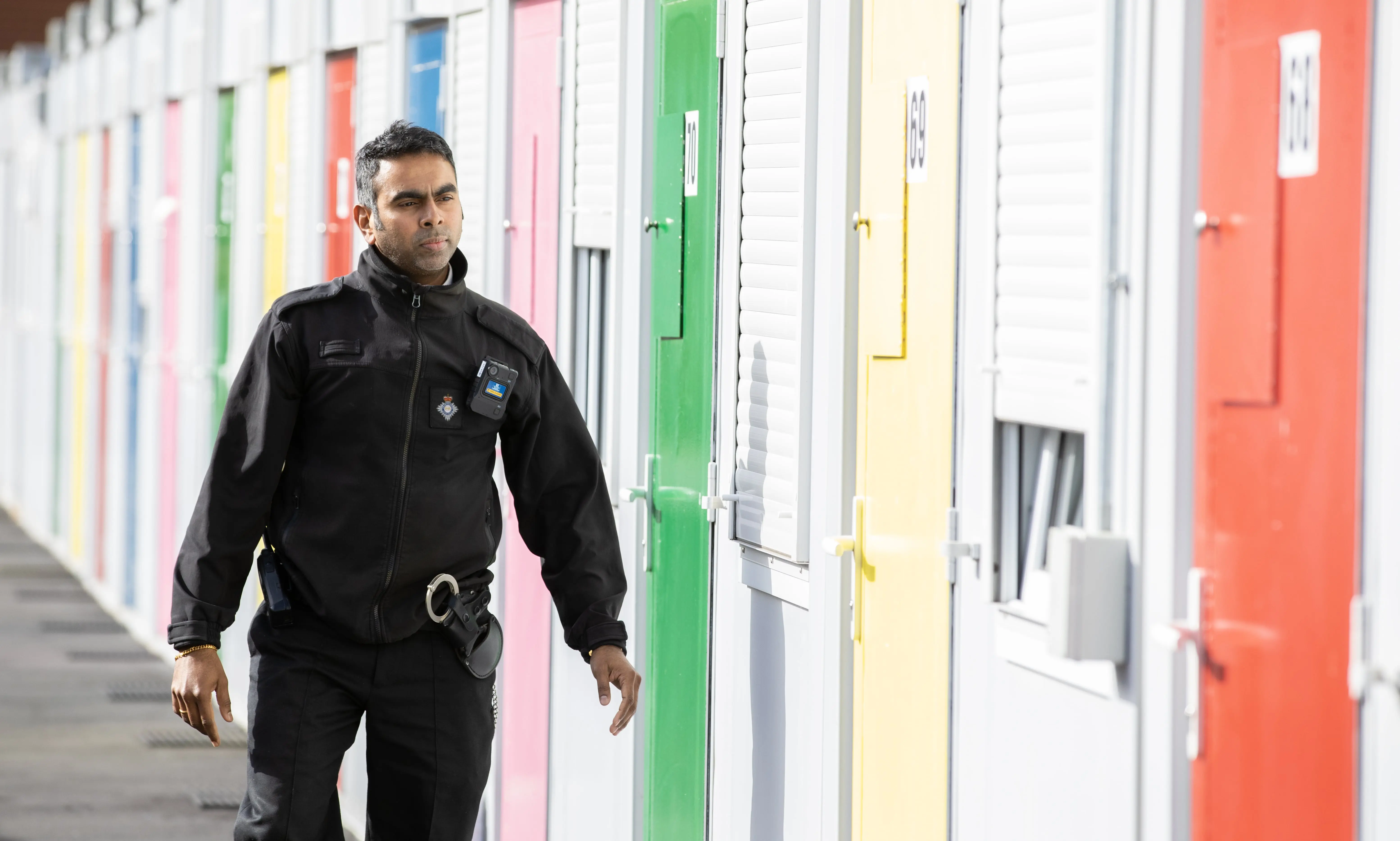 HMPPS worker smiles towards a colleague